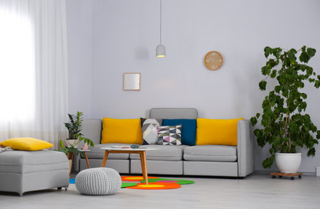 Elegant living room interior with comfortable sofaの写真素材