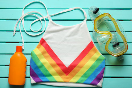 Flat lay composition with beach objects on color backgroundの写真素材