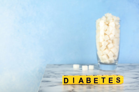 Word DIABETES made of cubes on tableの写真素材