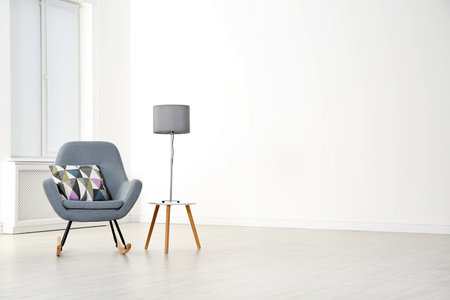 Elegant room interior with stylish comfortable armchairの写真素材