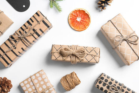 Flat lay composition with Christmas gifts on white backgroundの写真素材