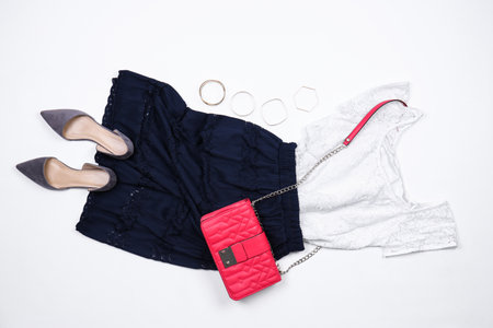 Set of stylish clothes and accessories on white background, flat layの写真素材