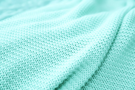 Texture of warm knitted mint blanket, closeupの写真素材