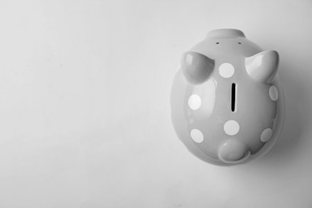 Cute piggy bank on white background, top viewの写真素材