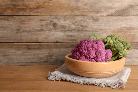 Plate with different cabbages on wooden table. healthy foodの写真素材