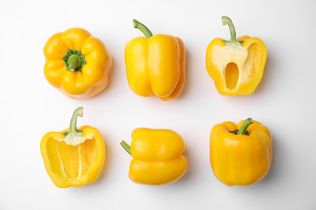 Flat lay composition with raw ripe paprika peppers on white backgroundの写真素材