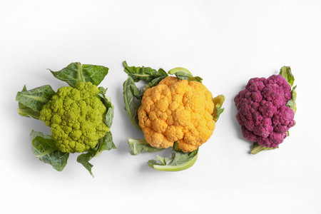 Colorful cauliflower cabbages on white background. healthy foodの写真素材