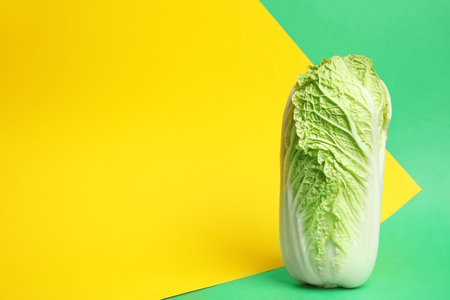 fresh ripe cabbage on color backgroundの写真素材