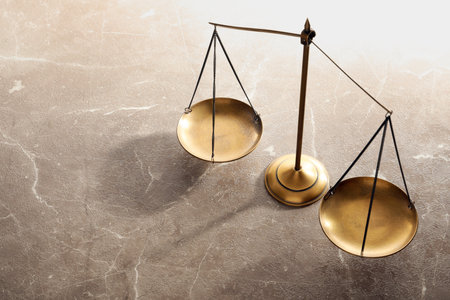Scales of justice on table. law concept