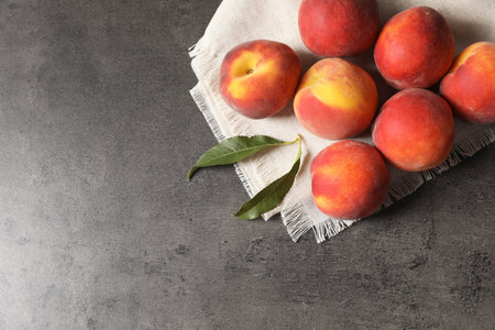 Fresh sweet peaches on table, top viewの写真素材