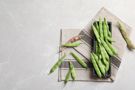 Composition with fresh green beans on table, top viewの写真素材
