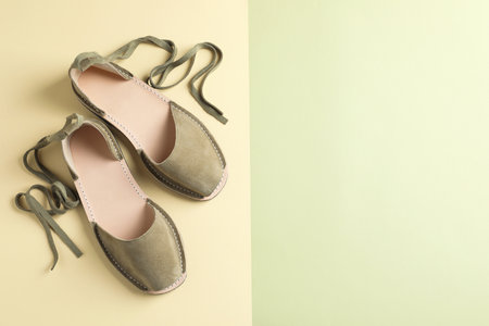 Pair of trendy women's shoes on color backgroundの写真素材