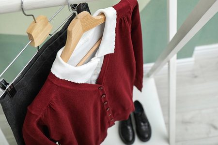 School uniform for girl on hangers, closeupの写真素材