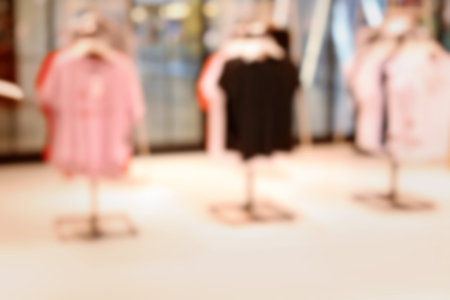 Blurred view of modern store with different clothesの写真素材