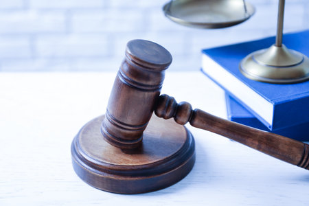 Wooden gavel, scales of justice and books on table, closeup. law conceptの写真素材