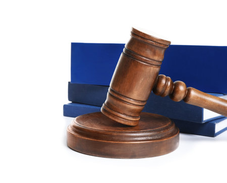 Wooden gavel and books on white background. law conceptの写真素材