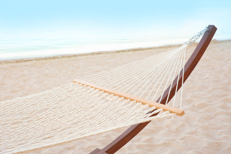 Empty hammock at seaside. Time to relaxの写真素材