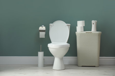 Bathroom with automatic air freshener on wallの写真素材