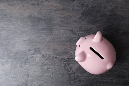 Pink piggy bank on table, top viewの写真素材