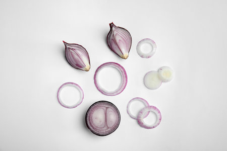 Beautiful composition with ripe red onions on white backgroundの写真素材