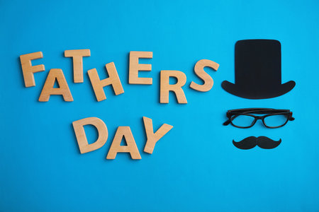 Flat lay composition with paper decor and glasses on color background. Happy Father's Dayの写真素材