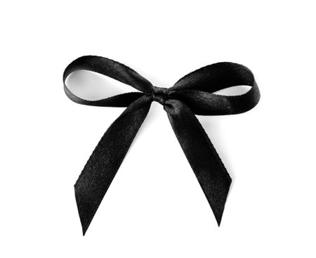 Black ribbon bow on white background. funeral accessoryの写真素材
