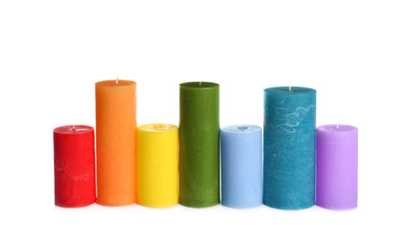 Various colorful wax candles on white backgroundの写真素材