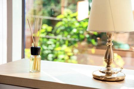 Aromatic reed air fresher on table indoors