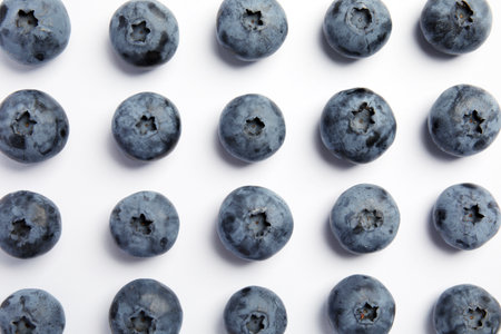 Flat lay composition with tasty blueberry on white backgroundの写真素材