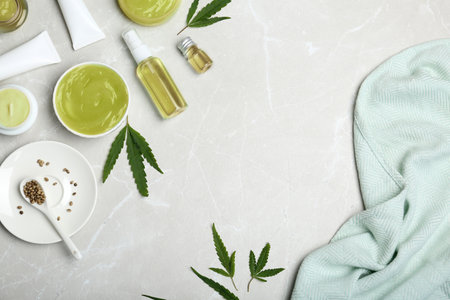 Flat lay composition with hemp lotion on gray backgroundの写真素材