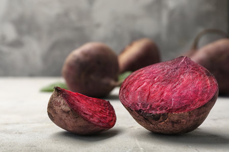 Cut ripe beet on table, close upの写真素材