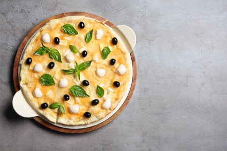 Fresh tasty homemade pizza and space for text on table, top viewの写真素材