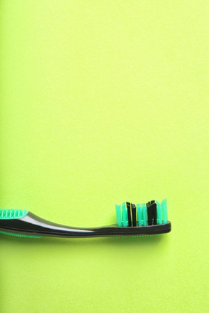 Manual toothbrush on color background. dental careの写真素材