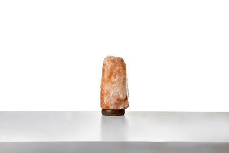 Exotic Himalayan salt lamp on white backgroundの写真素材