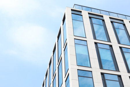 Building with tinted windows, outdoors. modern architectural design
