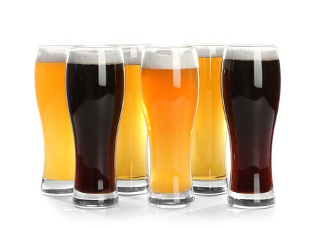 Glasses with different beer on white backgroundの写真素材