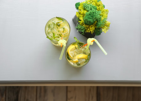 Glasses of iced lemonade on table, top viewの写真素材