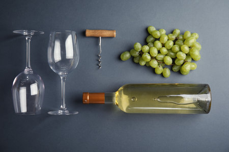 Flat lay composition with fresh ripe juicy grapes on color backgroundの写真素材
