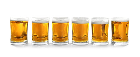 Glass mugs of beer on white backgroundの写真素材