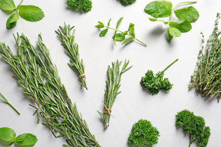 Flat lay composition with rosemary on light background. aromatic herbsの写真素材