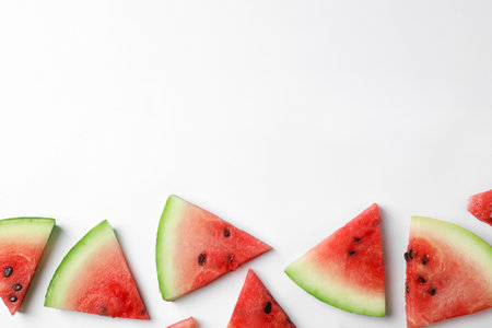 Slices of ripe watermelon on white background, top viewの写真素材