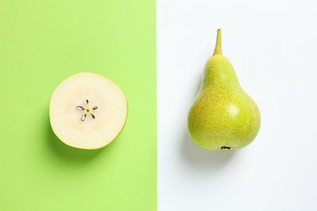Ripe juicy pears on color background, top viewの写真素材