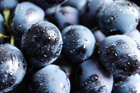 Bunch of fresh ripe juicy grapes as background. close-up viewの写真素材