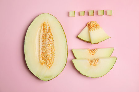 Flat lay composition with cut melon on color backgroundの写真素材