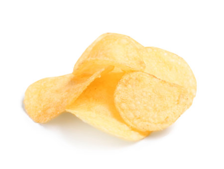 Tasty crispy potato chips on white backgroundの写真素材