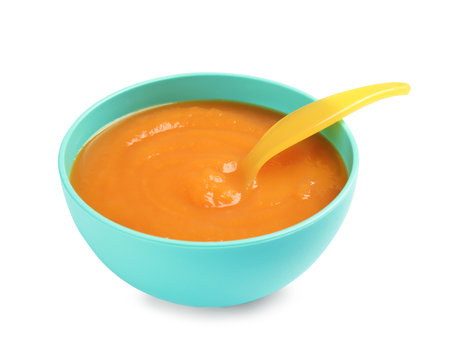 Bowl of healthy baby food on white backgroundの写真素材