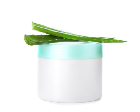 Jar with aloe vera balm and fresh leaves on white backgroundの写真素材