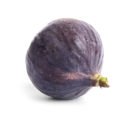 Whole ripe purple fig on white backgroundの写真素材