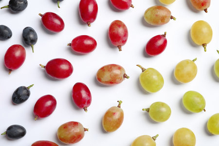 Fresh ripe juicy grapes on white background, top viewの写真素材
