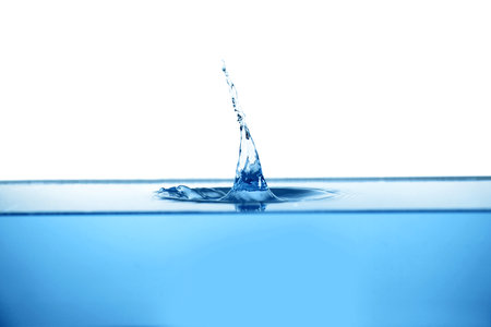 splash of blue water on white backgroundの写真素材
